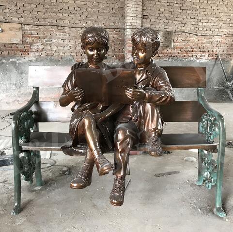 boy and girl reading book