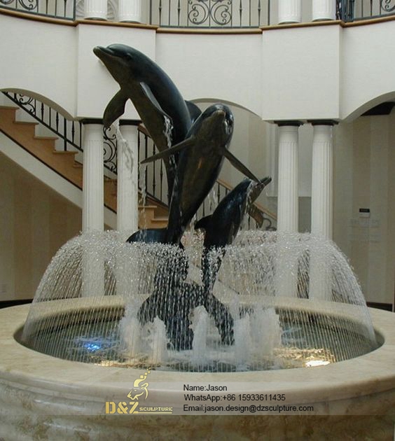 Indoor bronze dolphin fountain