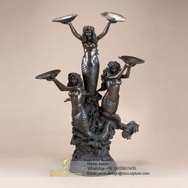 Indoor bronze mermaids fountain