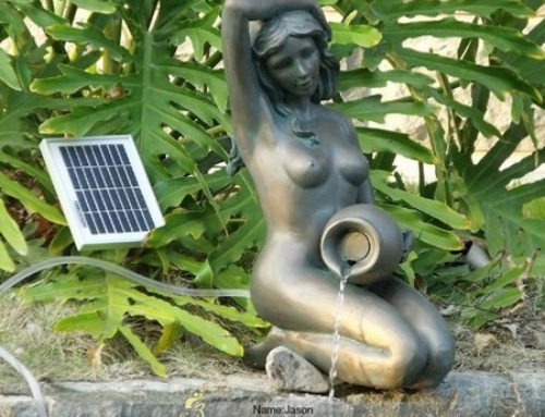 Female pouring bronze fountain