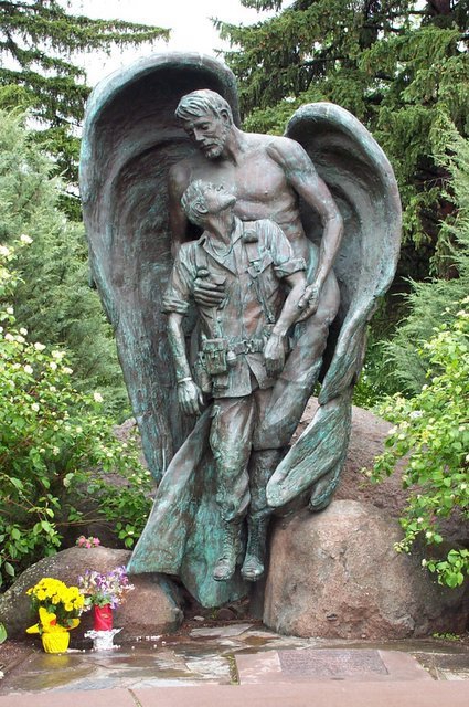 Angel carrying soldier