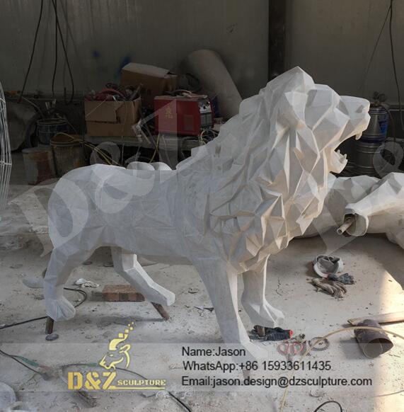 White outdoor lion sculpture