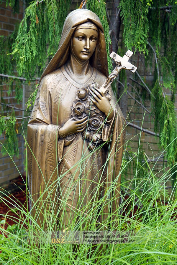 Female hold a cross to praying 