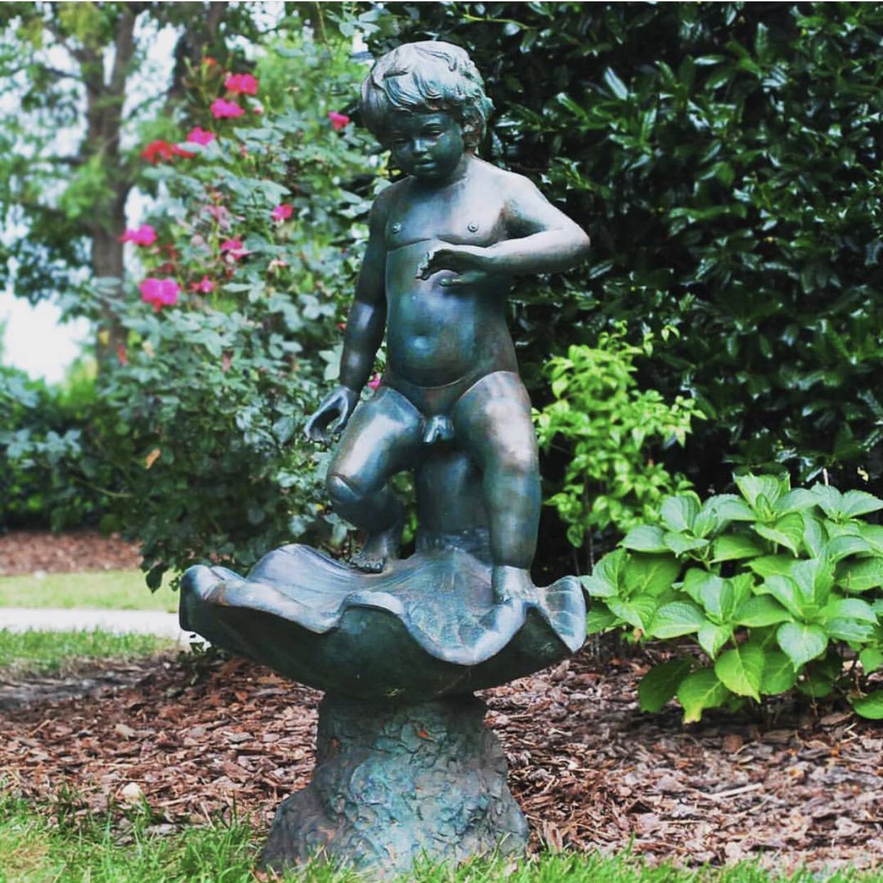 boy statue peeing fountain