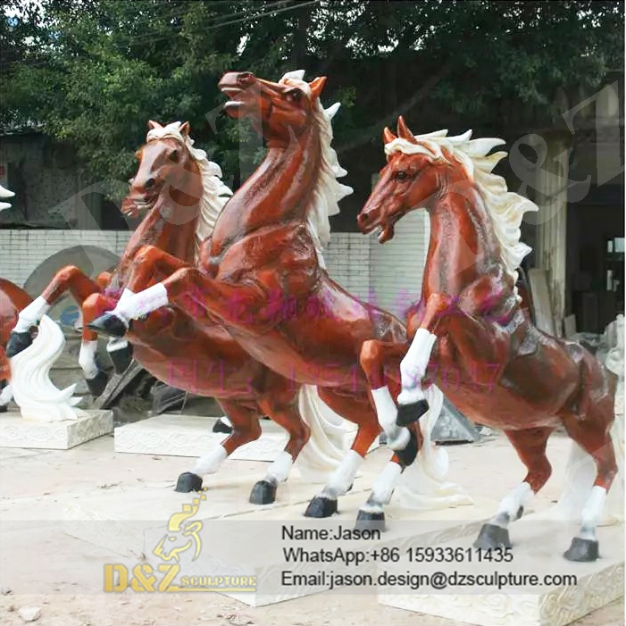Three horse sculptures