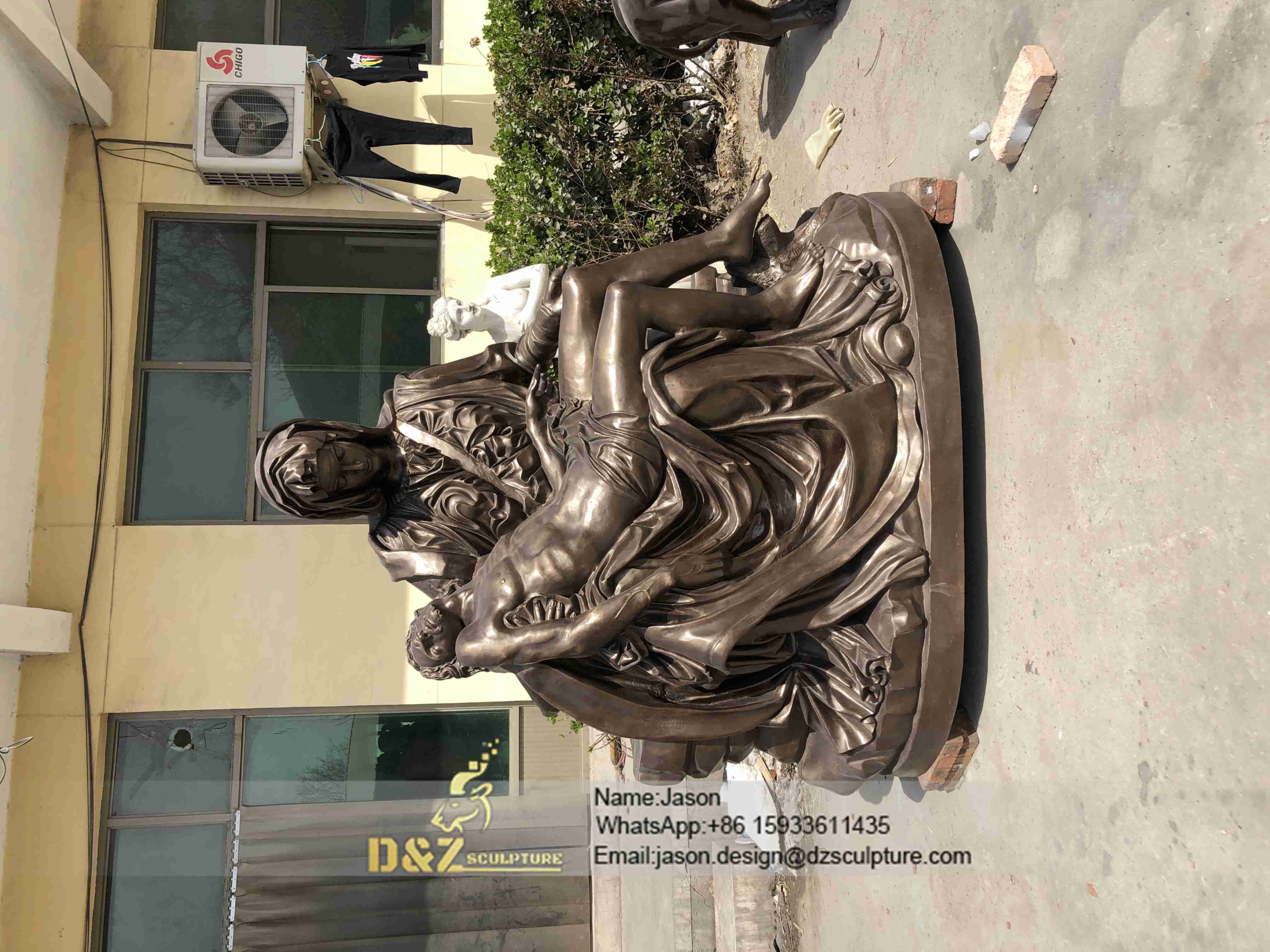Embrace vivid bronze pieta statue 