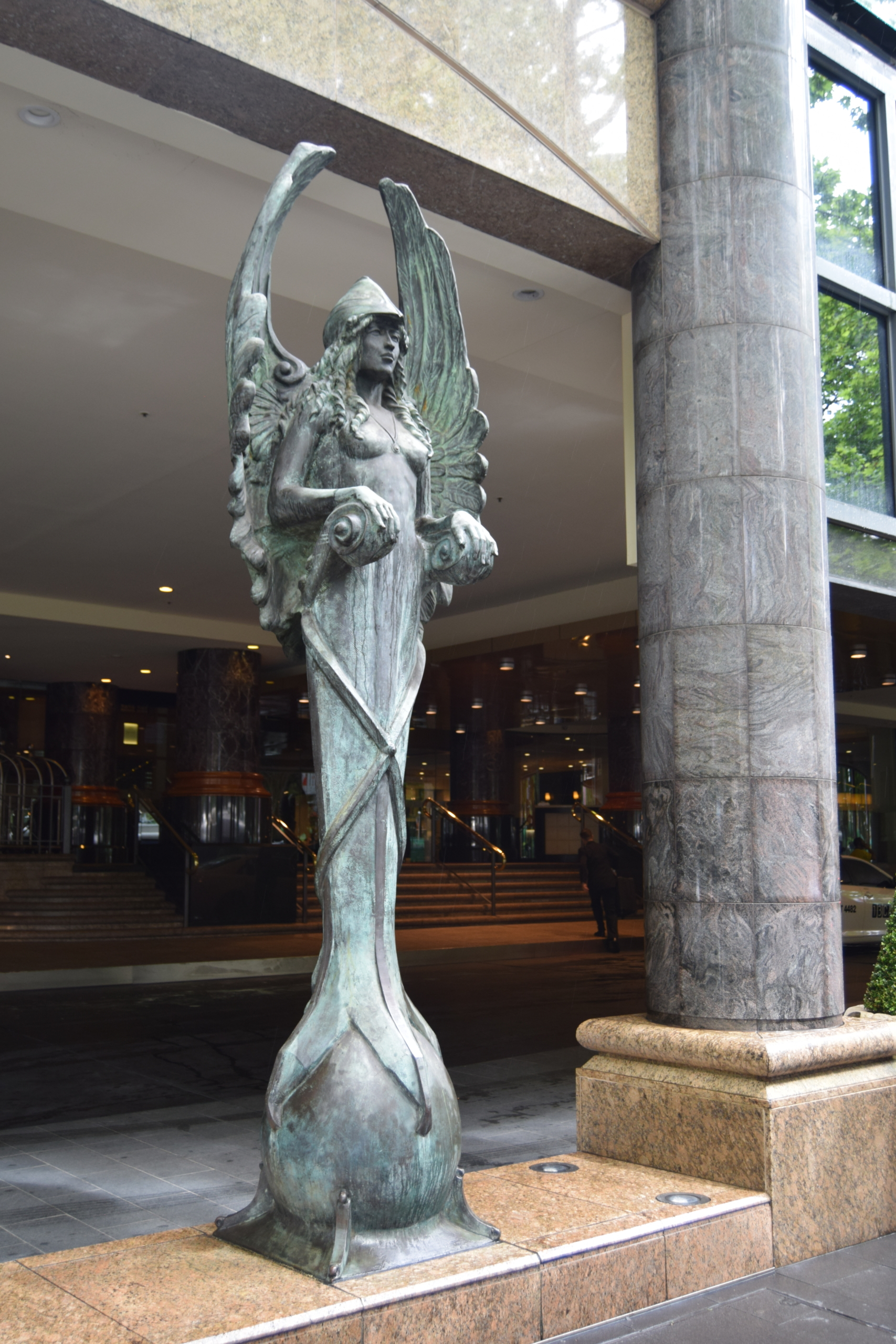 large bronze angel sculpture