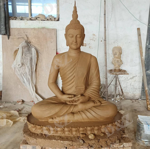 clay buddha statue
