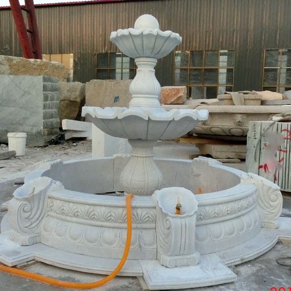 Tiered water fountain statue
