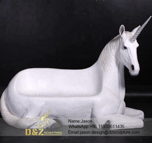 White garden unicorn sculpture