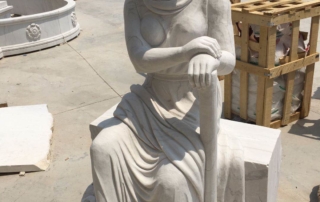 carves statue