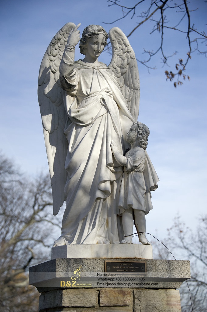 Angel with child sculpture