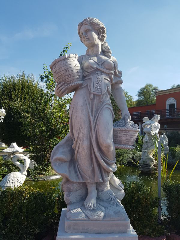 Garden flower girl statue