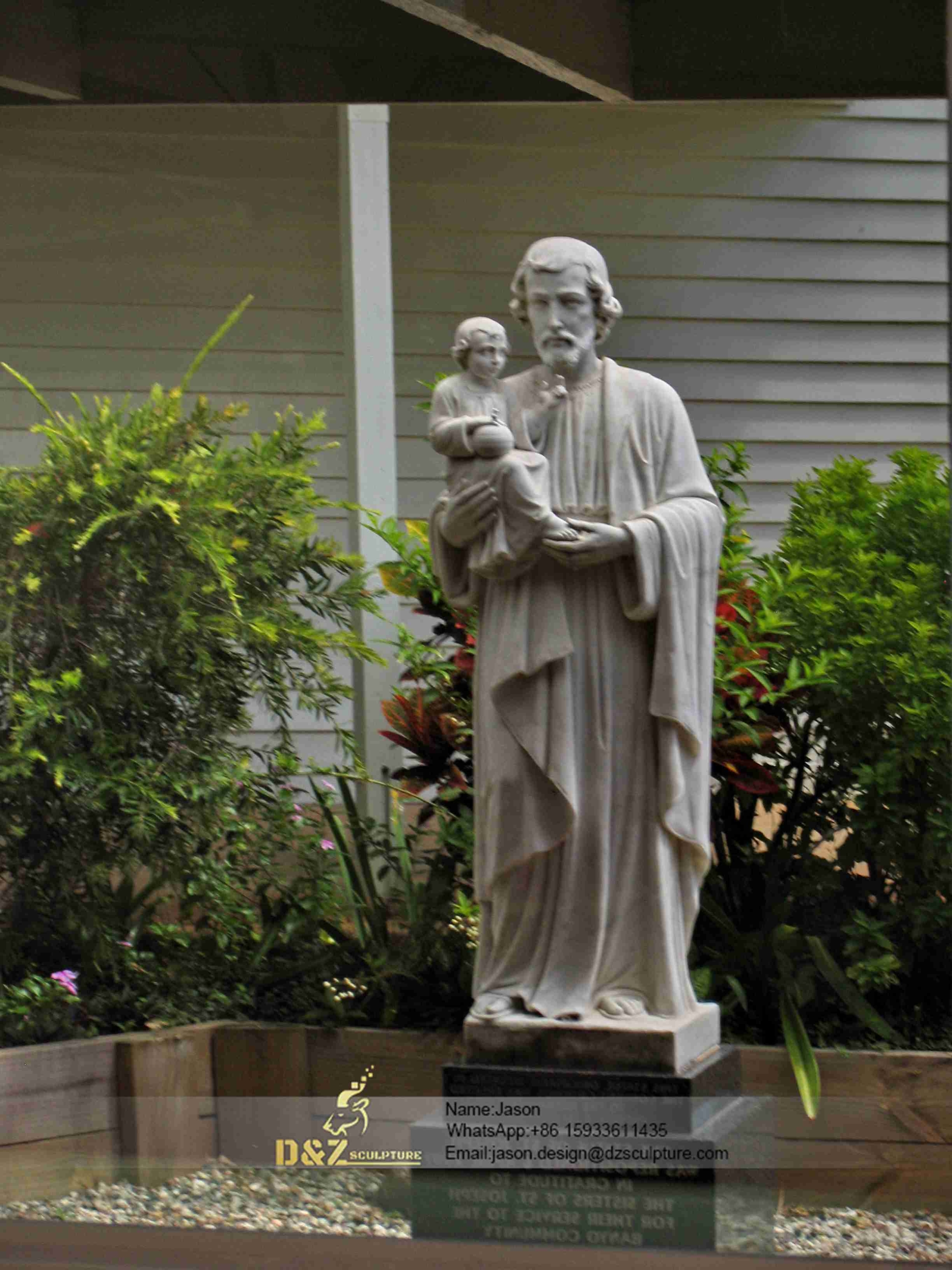 Saint Joseph with jesus sculpture