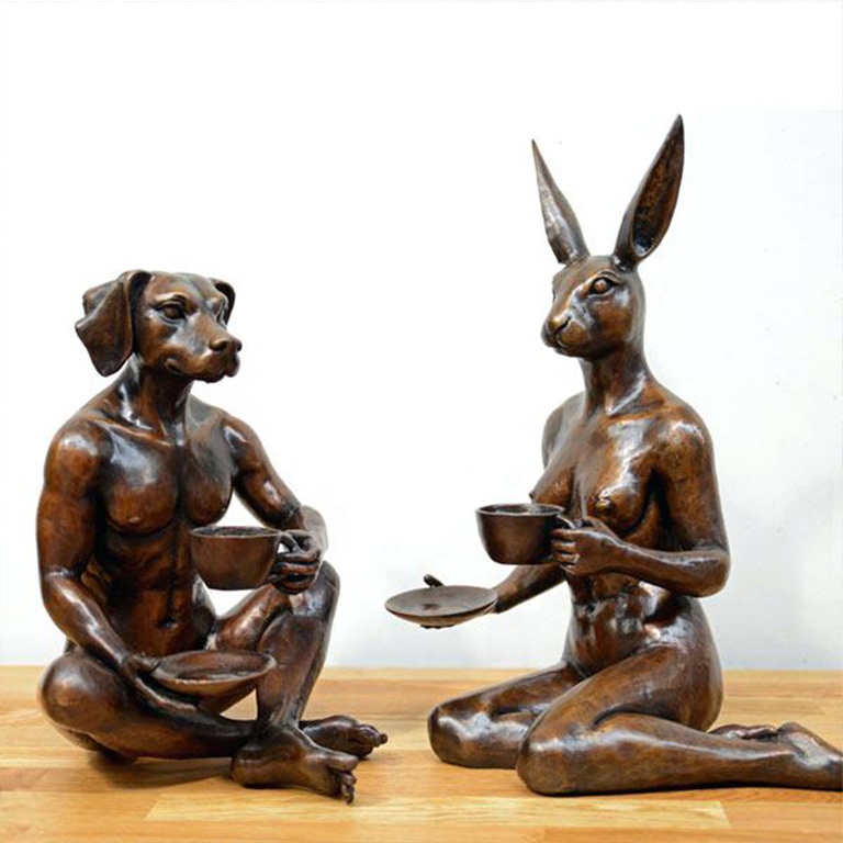 Dog and rabbit bronze sculpture
